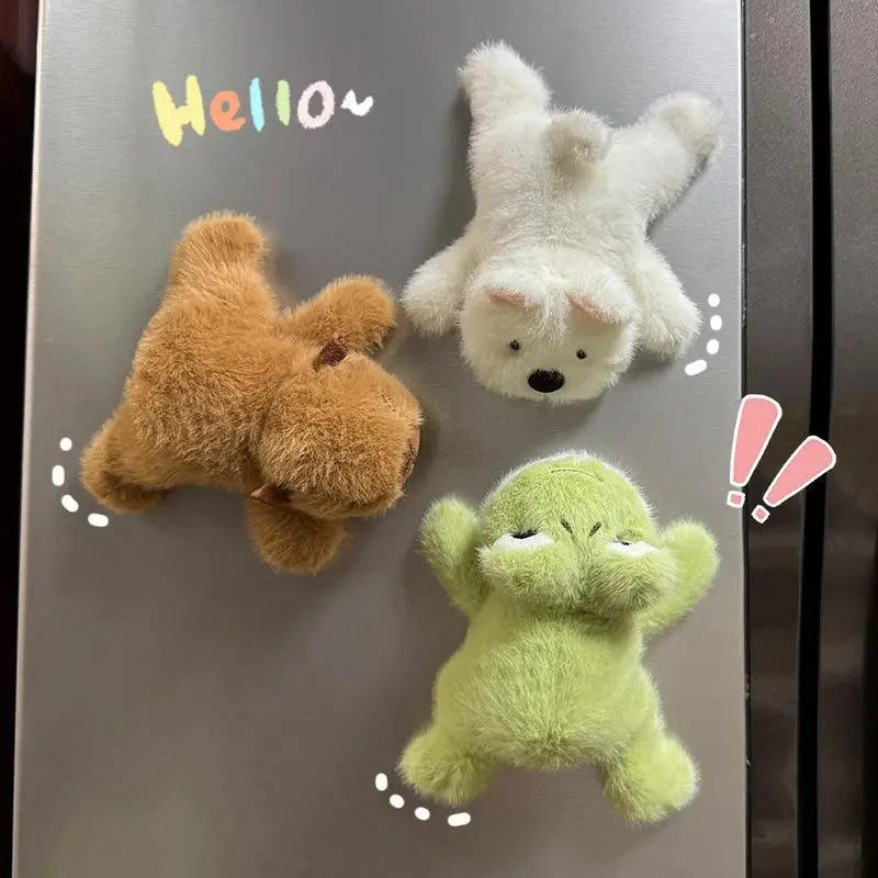 Several plush buddies stuck to a fridge door