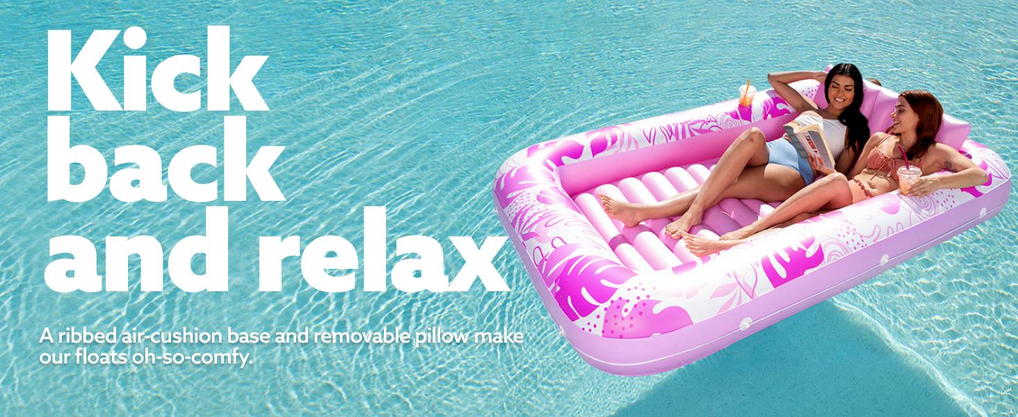 Removable pillow and ribbed cushion base on inflatable tanning lounge