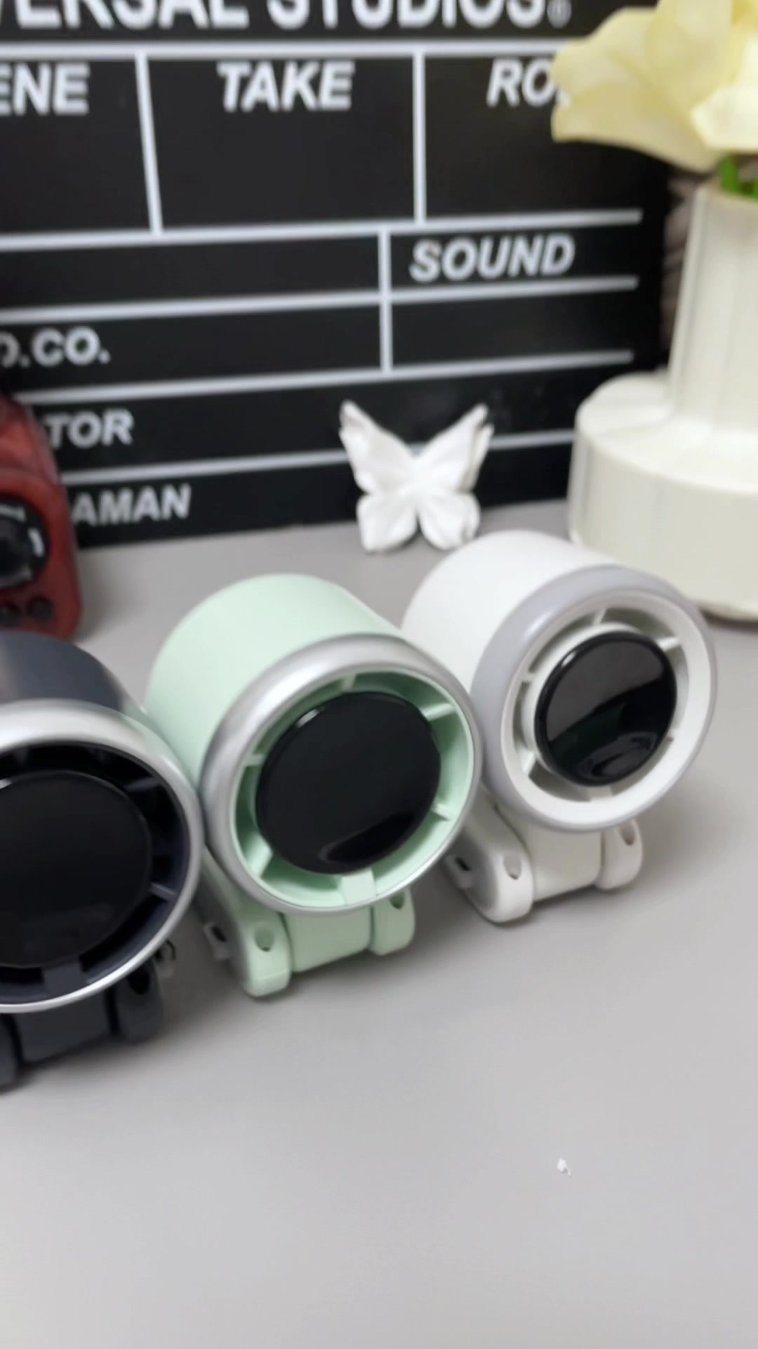 Portable fan color options on desk