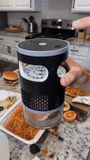 Twisting off the clear collection cup full of trapped insects